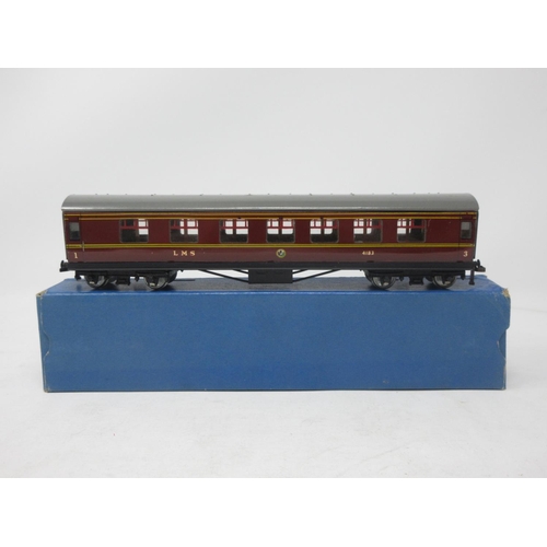 32 - Two boxed Hornby Dublo 3-rail L.M.S. Brake Coaches and a boxed 1/3 Class