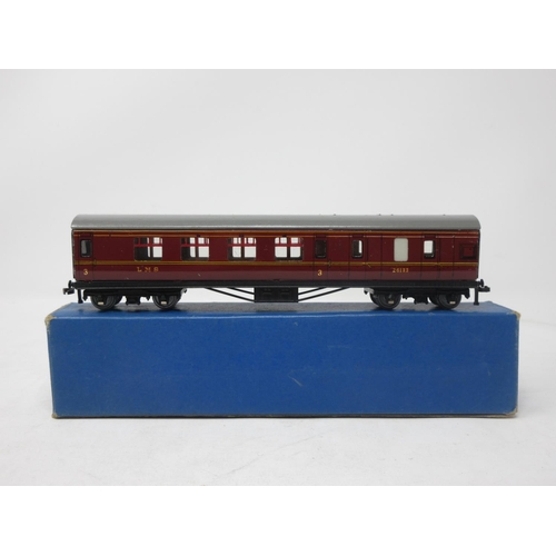 32 - Two boxed Hornby Dublo 3-rail L.M.S. Brake Coaches and a boxed 1/3 Class