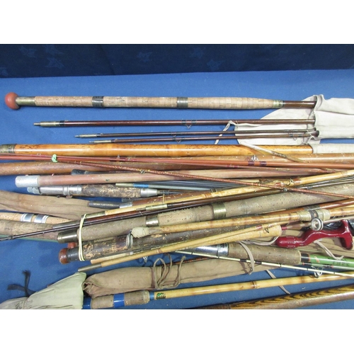 348 - A large quantity of Rods and Handles including a split cane 11ft light Salmon Rod, a Hardy's Graphit... 