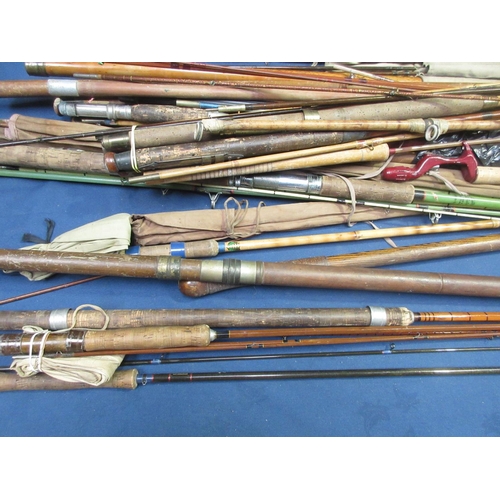 348 - A large quantity of Rods and Handles including a split cane 11ft light Salmon Rod, a Hardy's Graphit... 