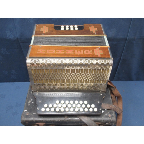 379 - A Hohner Modell III Accordian in case