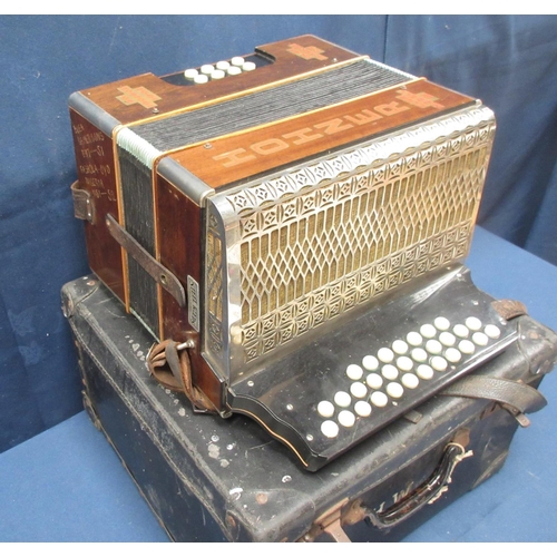 379 - A Hohner Modell III Accordian in case