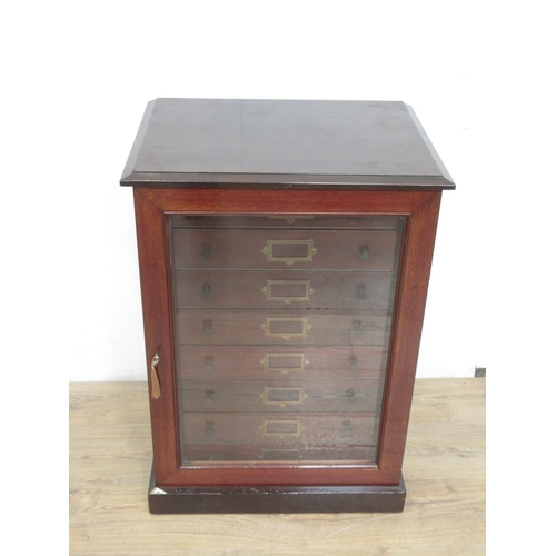 422 - An Edwardian mahogany Collector's Cabinet fitted single glazed door enclosing eight drawers with key... 