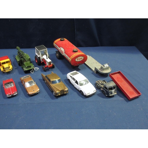 60 - A quantity of playworn diecast including a tinplate Esso Tanker Trailer, a Corgi David Brown Tractor... 