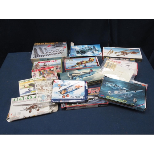 7 - Two boxes of plastic Kits including Hansa Brandeburg, Fiat CR-32, Pfalz DXII, Fokker D-XXI, esoteric... 