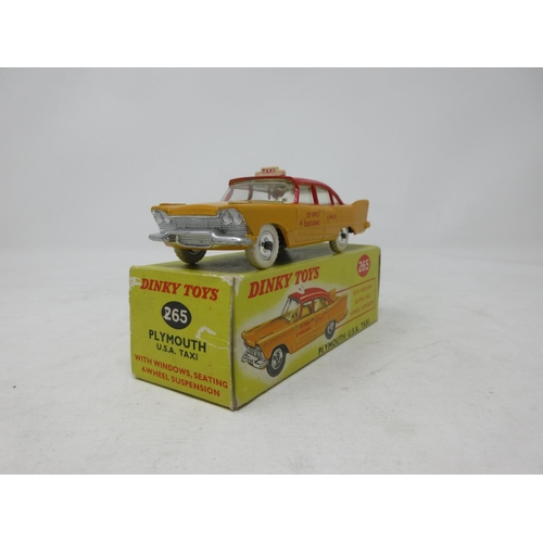 74 - A boxed Dinky Toys No.265 Plymouth U.S.A. Taxi