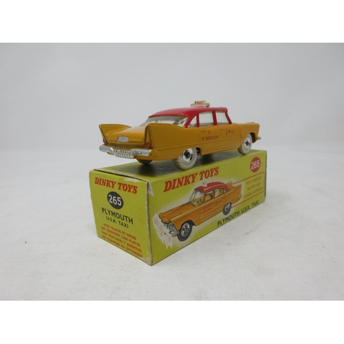 74 - A boxed Dinky Toys No.265 Plymouth U.S.A. Taxi