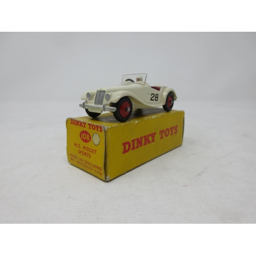 76 - A boxed Dinky Toys No.108 cream MG Midget