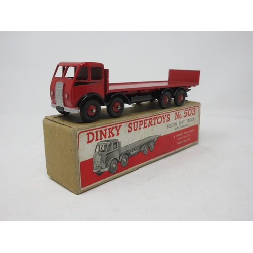 96 - A boxed Dinky Supertoys No.503 1st type red and black Foden Flat Truck with tailboard with 'R' to bo... 