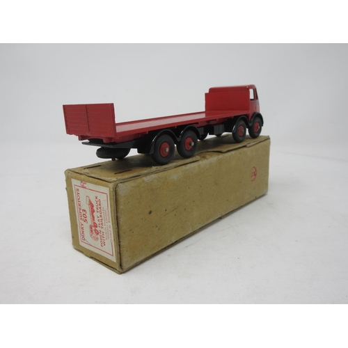 96 - A boxed Dinky Supertoys No.503 1st type red and black Foden Flat Truck with tailboard with 'R' to bo... 