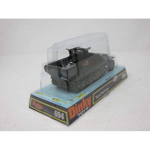 99 - A perspex boxed Dinky Toys No.694 Tank Destroyer