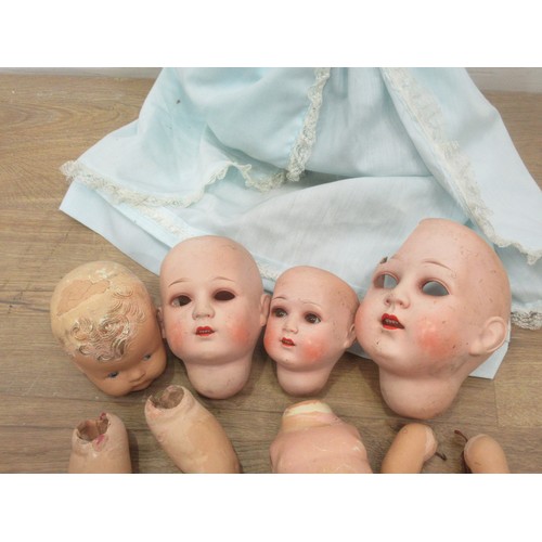 218 - An Ideal American 1960's Baby Doll in original condition and a basket of old bisque and celluloid Do... 