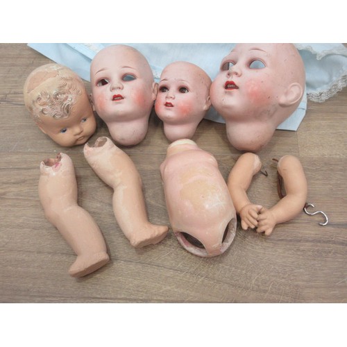 218 - An Ideal American 1960's Baby Doll in original condition and a basket of old bisque and celluloid Do... 