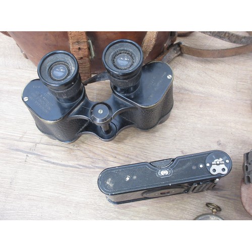 240 - A pair of military Binoculars stamped Bino. prism Mk II No.77506 in leather case, a pair of Zeiss Bi... 