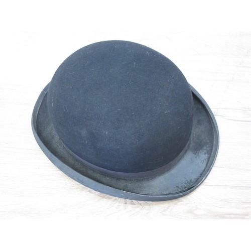 427A - A black Bowler Hat by Locke & Co. 7 3/4in, another by Hillhouse & Co. 7 1/2in and another by Roland ... 