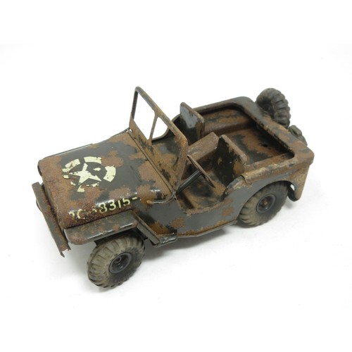 230 - A Tri-ang 1960's tinplate clockwork Jeep and a tinplate clockwork Dumper Truck