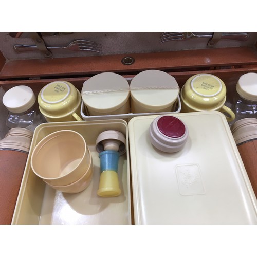 356 - A Brexton Picnic Set in case, with outer cover, includes two Thermos flasks, plates, bowls, food con... 