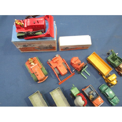 50 - A boxed Dinky Toys No. 561 Blaw Knox Bulldozer, an empty Guy Flat Bed Box and quantity of unboxed Di... 