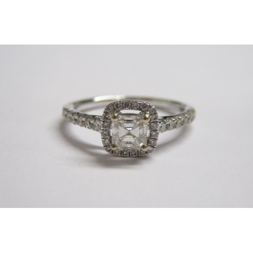 177 - A Diamond halo Cluster Ring corner claw-set asscher-cut stone within pave-set brilliant-cut stones i... 