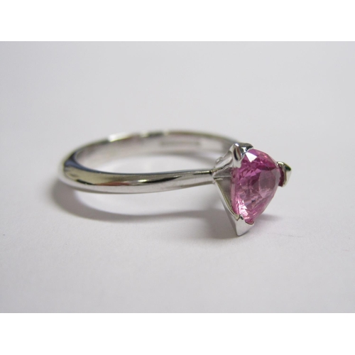 196 - A Pink Sapphire single stone Ring corner claw-set trilliant-cut stone in 18ct white gold, ring size ... 