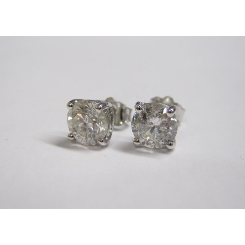 202 - A pair of Diamond Ear Studs each claw-set brilliant-cut stone, total diamond weight 2.06cts, in 18ct... 