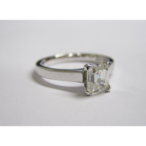 203 - A Diamond single stone Ring corner claw-set step-cut stone, 1.01cts, in 18ct white gold, ring size M... 