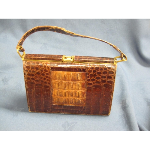 229 - Two vintage crocodile skin Handbags