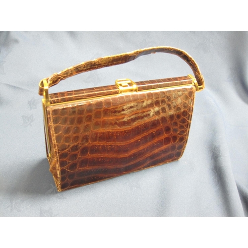 229 - Two vintage crocodile skin Handbags