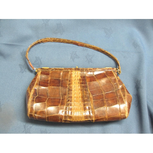 229 - Two vintage crocodile skin Handbags