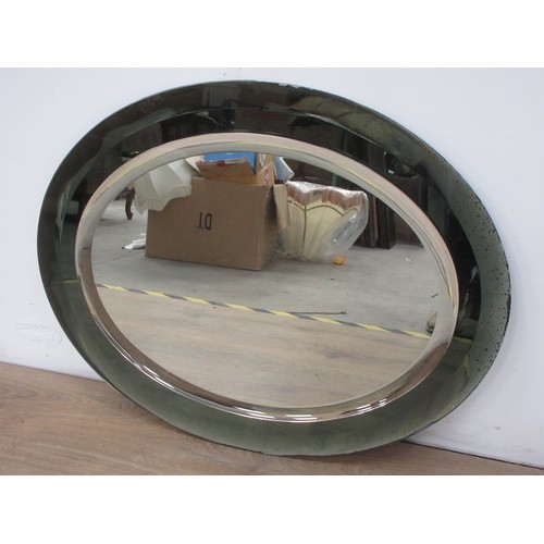 64 - An oval two tier Mirror 2ft 7in