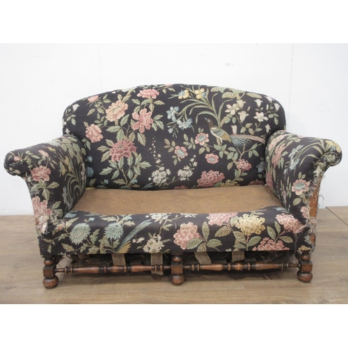 72 - A floral upholstered two seat Settee with turned and squared supports and stretchers, 5ft W, in need... 