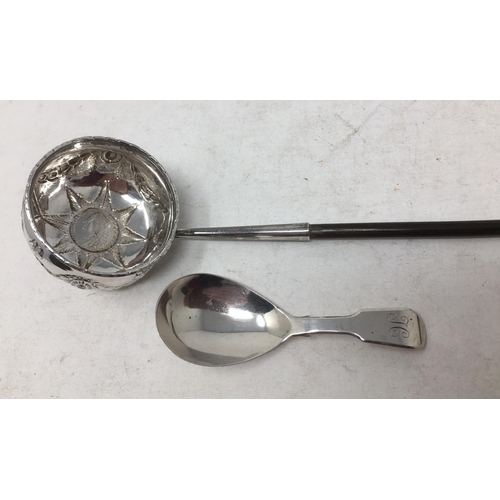 246 - A Georgian silver Toddy Ladle with swag embossing, coin inset bowl and spiral handle, and a Caddy Sp... 