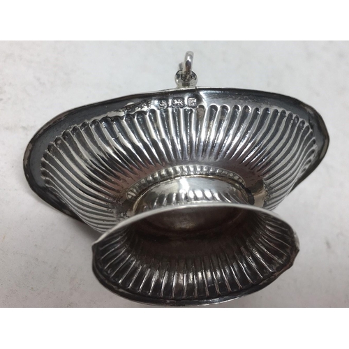 248 - An Edward VII silver miniature toy Cake Basket of oval fluted form with swing handles, Birmingham 19... 