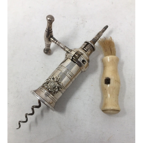 250 - A plated Rack and Pinion Corkscrew with applied coat of arms, turned bone handle and brush.