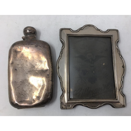 254 - A George V silver Hip Flask, Sheffield 1911, 190 gms, A/F, and a silver Photograph Frame, Birmingham... 