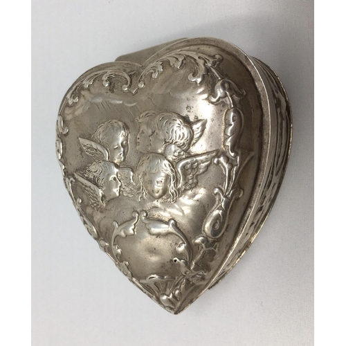 255 - An Edward VII silver heart-shaped Trinket Box with hinged cover, embossed cherub; London 1902, maker... 