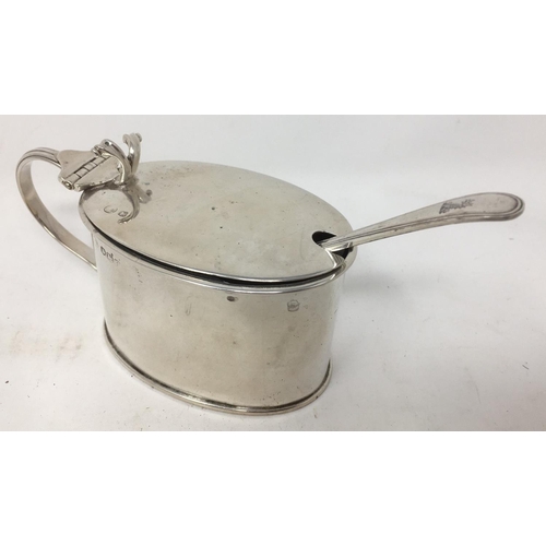 257 - A George V large silver oval Mustard Pot with hinged cover, Sheffield 1927, and Spoon, London 1906.