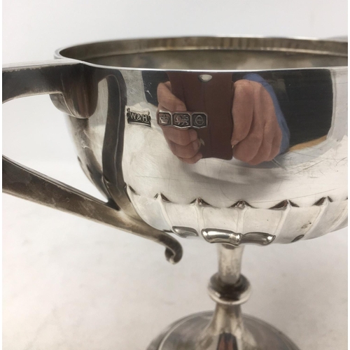 259 - A George V silver two handled semi-fluted Trophy with presentation inscription, Sheffield 1922, make... 