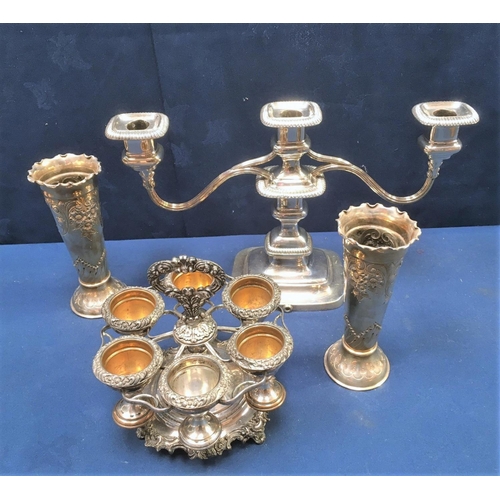 273 - A 19th Century Sheffield plated six Egg Cup Set on stand with scroll borders and central handles, a ... 