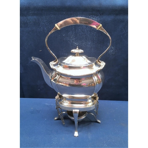 278 - A plated Tea Kettle on stand of shaped oval form, engraved crest and motto, the stand with spirit bu... 