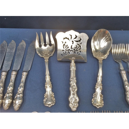 286 - A pair of sterling silver Servers with ornate scroll stems and bowls, a Server with pierced blade, s... 