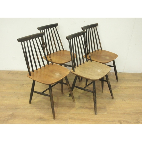 102 - A set of four 1950s kitchen Chairs with ebonised backs and legs.