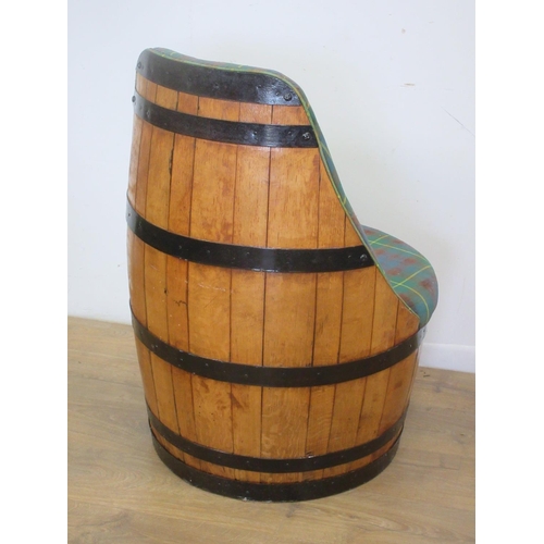 119 - An upholstered Chair made from a barrel