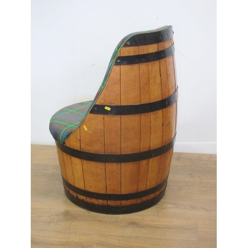 119 - An upholstered Chair made from a barrel