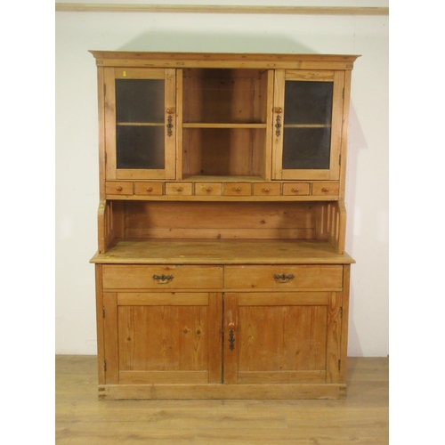 16 - A Victorian pine Kitchen Dresser and glazed cupboard and drawers upper section above base fitted two... 