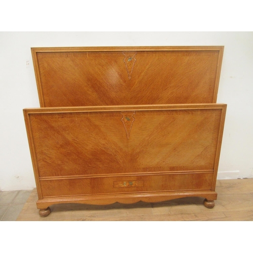 18 - A 20th Century oak and inlaid Bedroom Suite comprising two door Wardrobe, Dressing Chest, Chest of d... 