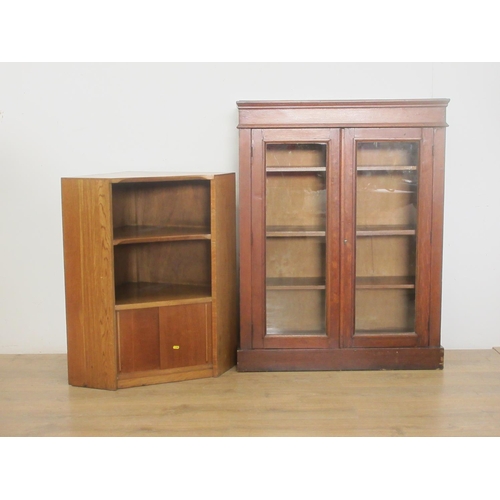 359 - An oak and glazed two door Bookcase with adjustable shelves 3ft 10in H x 2ft 11in W and a modern oak... 