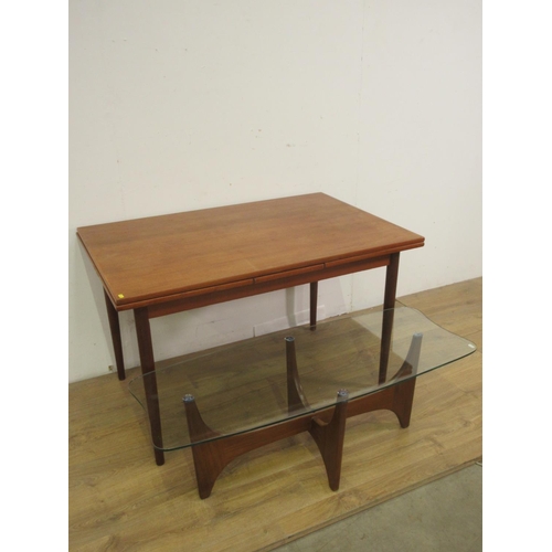 372 - A 1970's glass topped Coffee Table 3ft 11in W x 1ft 5in H and an extending Dining Table 3ft 11in W