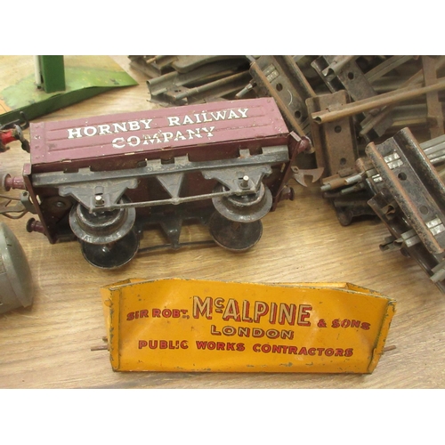 436 - A box of Hornby 0 gauge Clockwork including a Locomotive and tender, Level Crossing and Tack, a leat... 