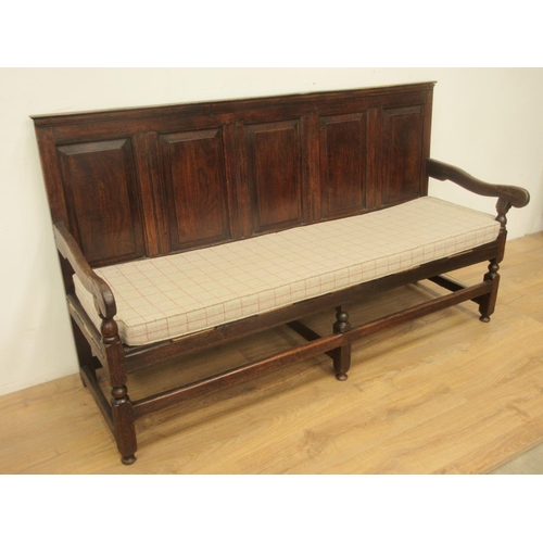 474 - An 18th Century oak five panel back Settle with cushioned drop in seat on turned supports 6ft 1in W ... 